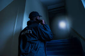 Security at night with flashlight